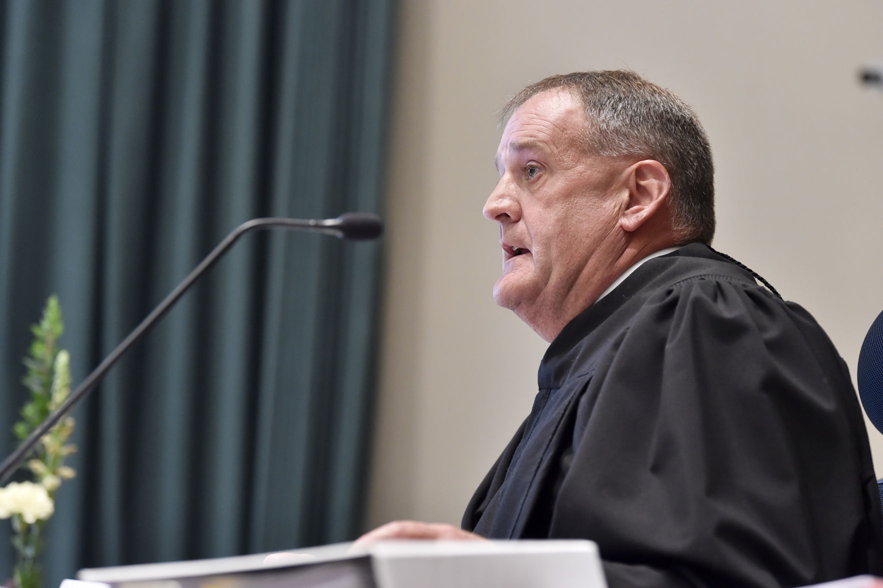Judge Mike McMahon rules Trude not guilty of the charge of tampering with evidence